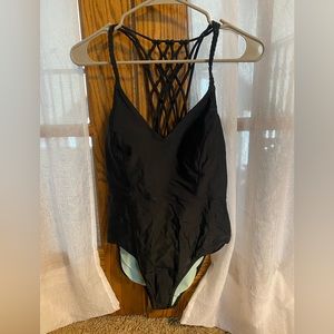 Cutie Prana one piece, Used/New! Size S. Super cute, decorative open back!